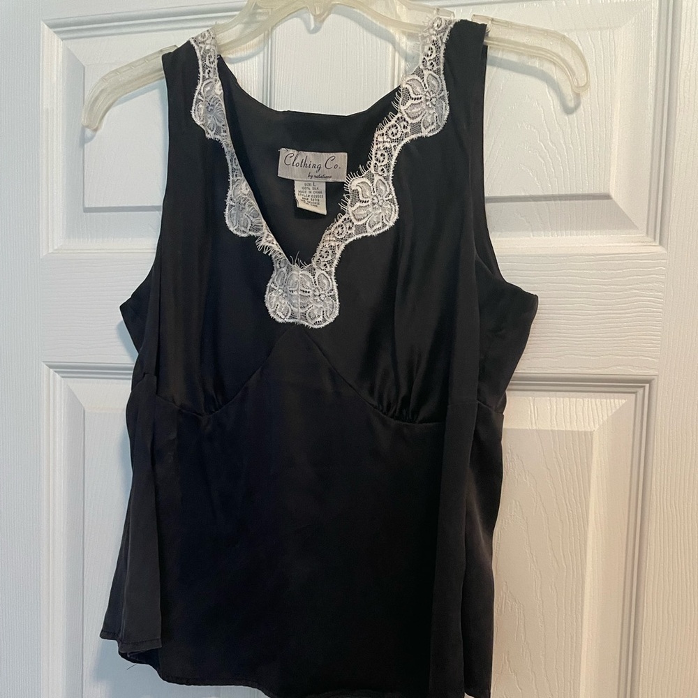 Preowned and in perfect condition!  Clothing co by notations LARGE